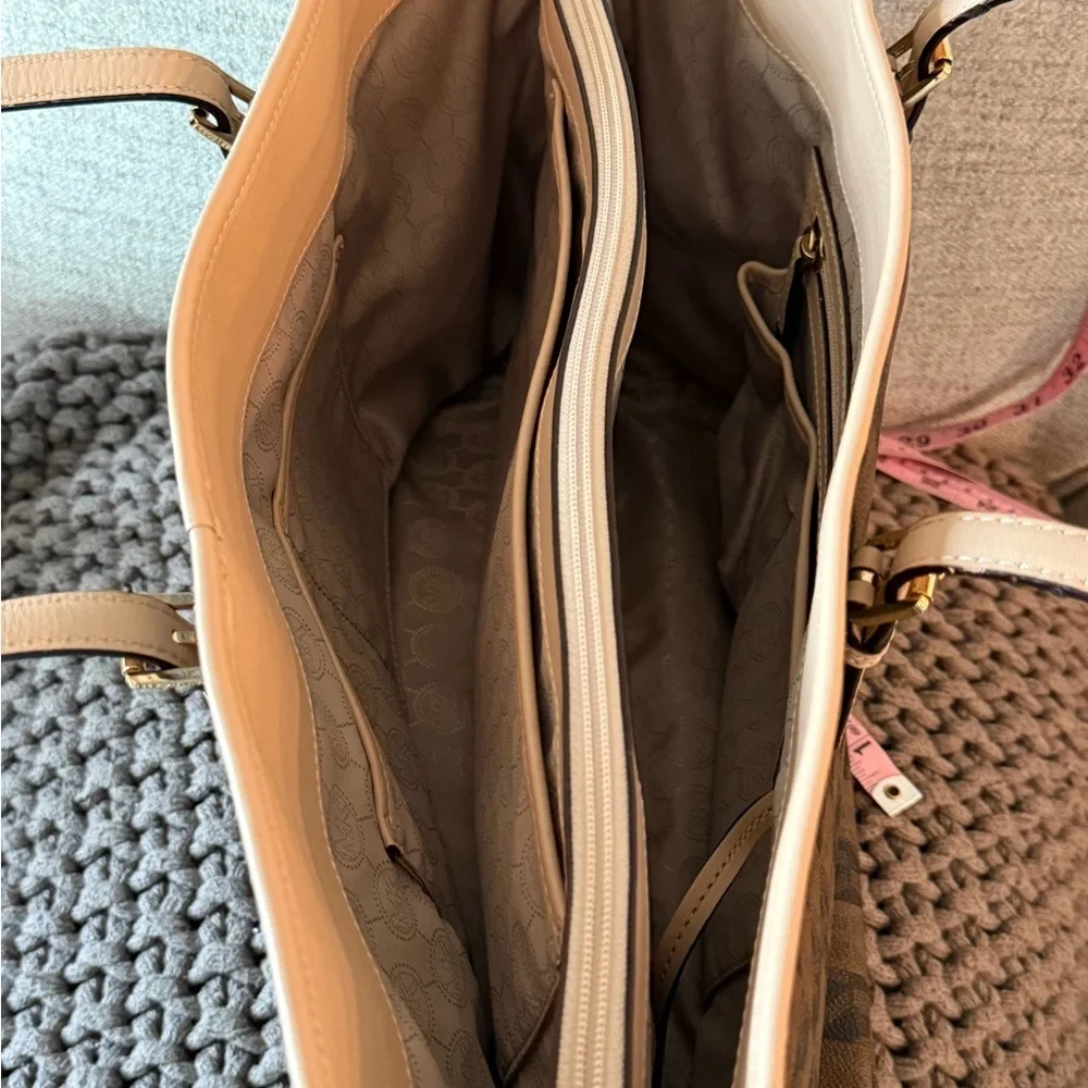 MICHAEL Michael Kors Jet Set travel tote in a brown checkered monogram pattern. - Picture 5 of 10